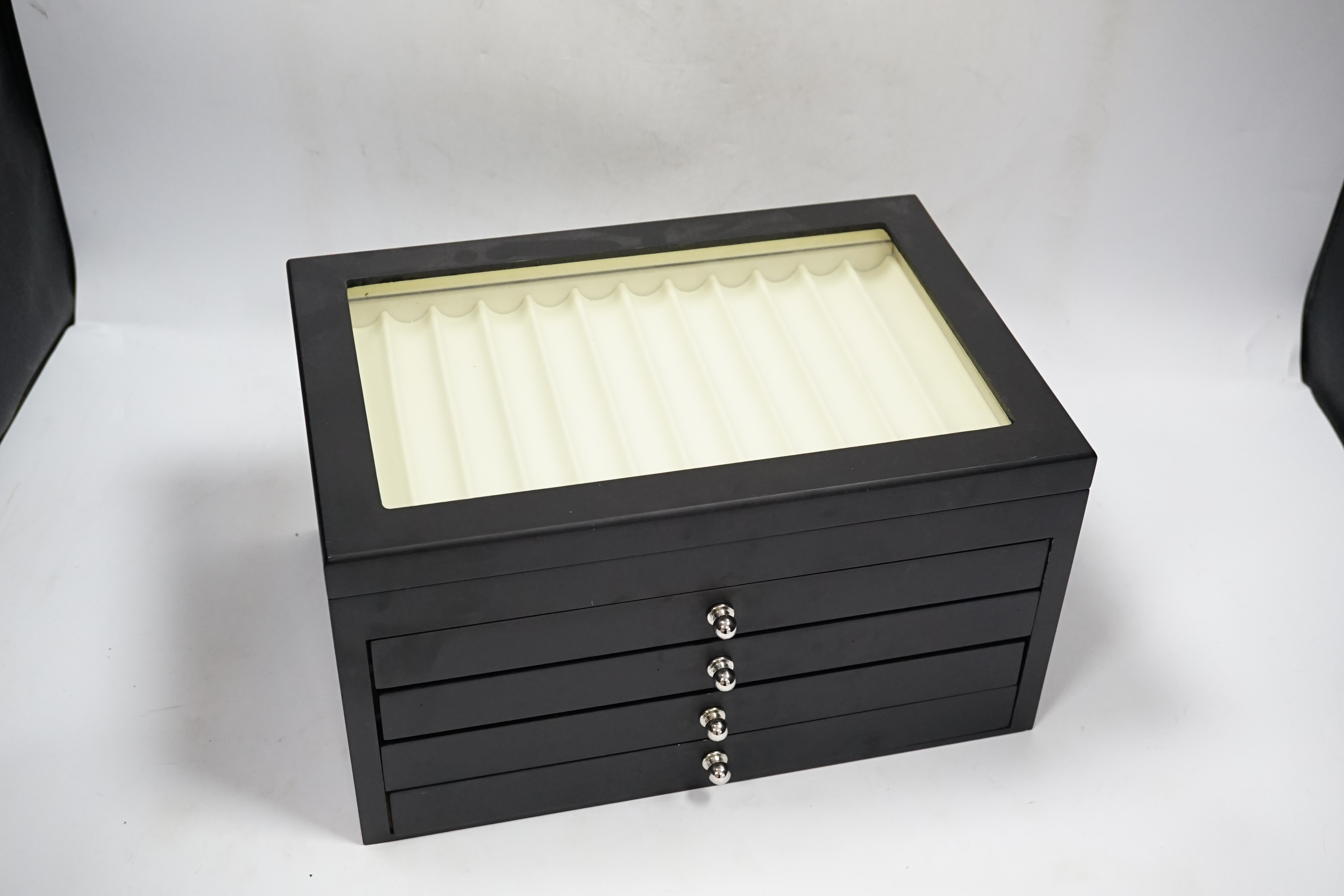 A fountain pen collectors' case in ebony finish, for fifty six pens